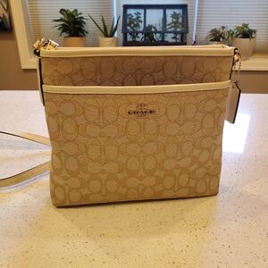 Coach Tan Crossbody Bag with Signature Design